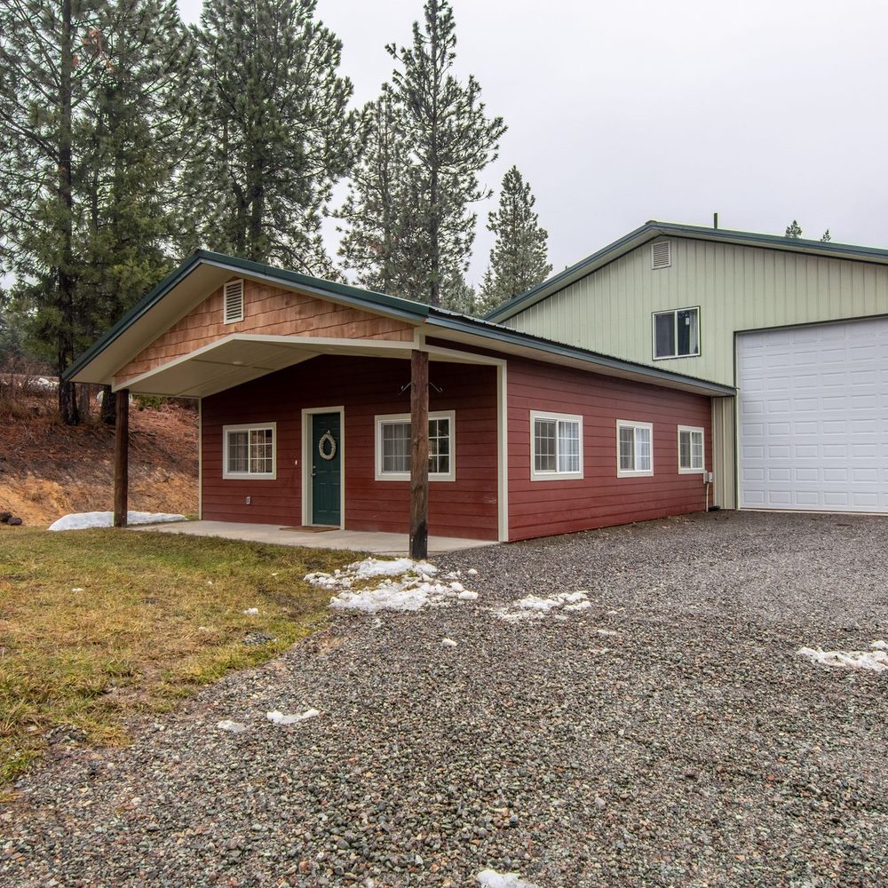 Rural home with a gravel driveway